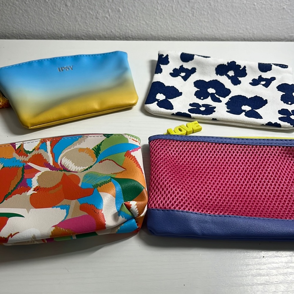 Four Ipsy cosmetic bags. New, never been used